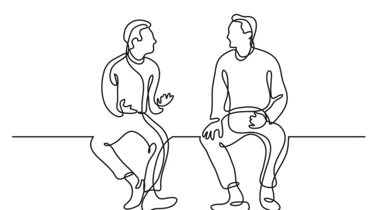 Coaching session - 2 men talking